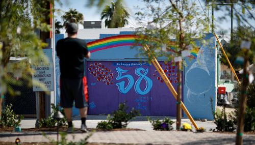 A mural honoring 58 victims adorns a building at the Las Vegas Community Healing Garden. (AP)