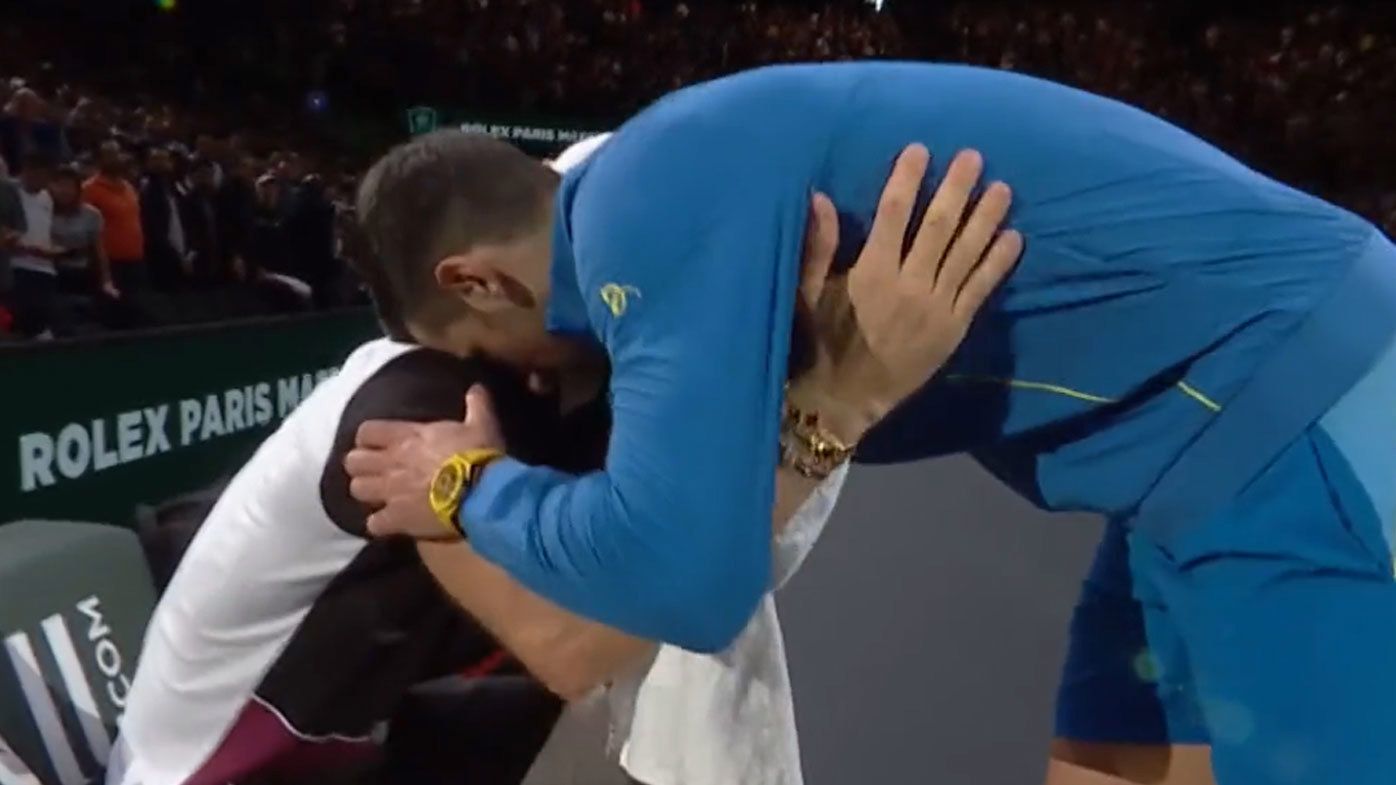 Novak Djokovic paused his post-match interview to share an embrace with Grigor Dimitrov