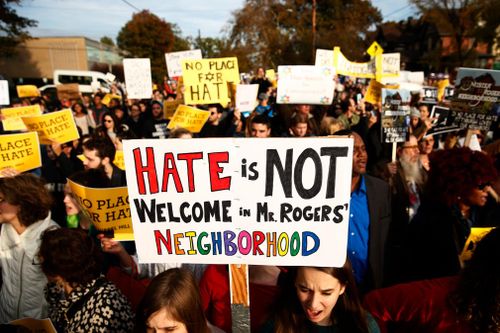 Multiple groups of marchers make their way towards the Tree of Life synagogue three days after a mass shooting in Pittsburgh, Pennsylvania.