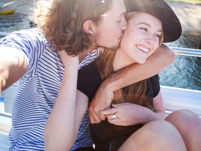 Young couple kissing.