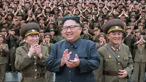 Kim Jong-un surrounded by loyal soldiers. (AAP)