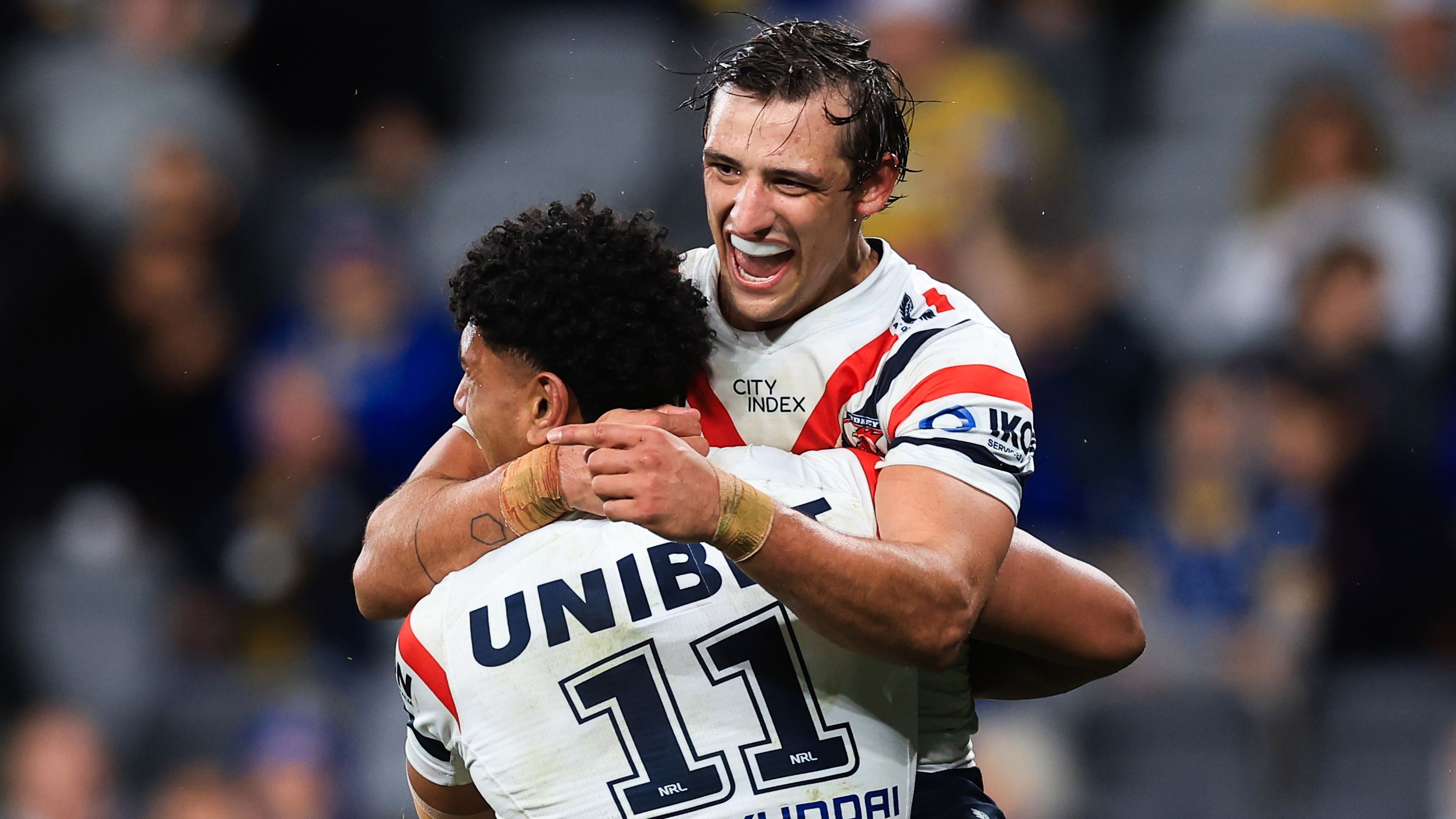Siua Wong of the Roosters celebrates a try with team mate Billy Smith during the round 25 NRL match between Parramatta Eels and Sydney Roosters at CommBank Stadium on August 18, 2023 in Sydney, Australia. (Photo by Mark Evans/Getty Images)