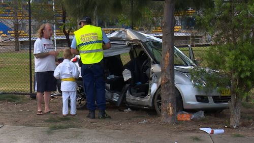 Driver flees after crashing stolen car into vehicle carrying young child in Sydney's west