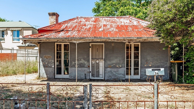 Rundown Adelaide cottage sells for almost $1 million