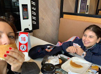 Jo Abi and her daughter having breakfast