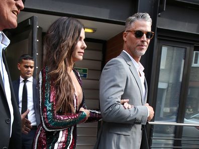Sandra Bullock and Bryan Randall seen leaving her hotel ahead of the 'Ocean's 8' film premiere on June 13, 2018 in London, England.