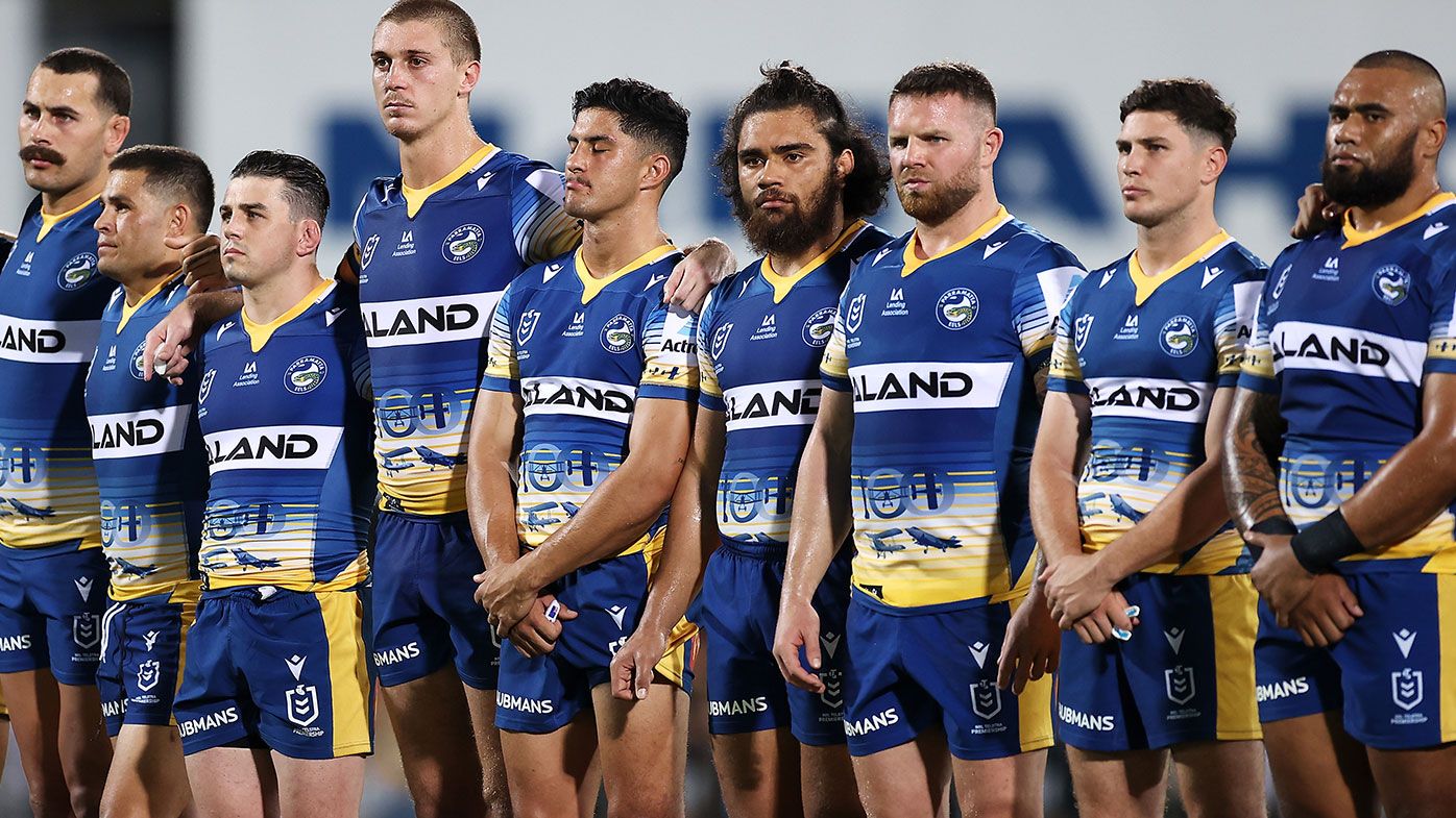  APRIL 23: Eels players pause during an ANZAC ceremony before the round seven NRL match between the Parramatta Eels and the Brisbane Broncos at TIO Stadium, on April 23, 2021, in Darwin, Australia. (Photo by Mark Kolbe/Getty Images)