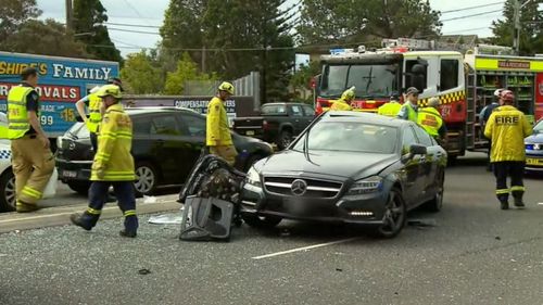 Emergency crews attend the scene of the crash, which has left Gai Vieira in hospital. 