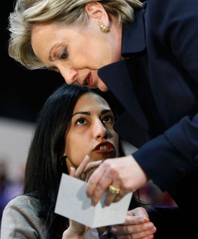 Presidential candidate Hillary Clinton speaks with his top aide Huma Abedin before a rally in California, Los Angeles February 2, 2008