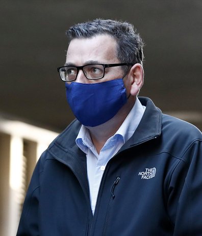 Victorian Premier Daniel Andrews wears a face mask as he walks in to the daily briefing on July 19, 2020 in Melbourne, Australia. 