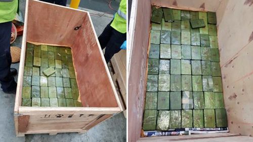 Inside the souvenirs, police discovered 400 blocks of heroin weighing 154 kilograms, carrying an estimated potential street value of more than $77 million.