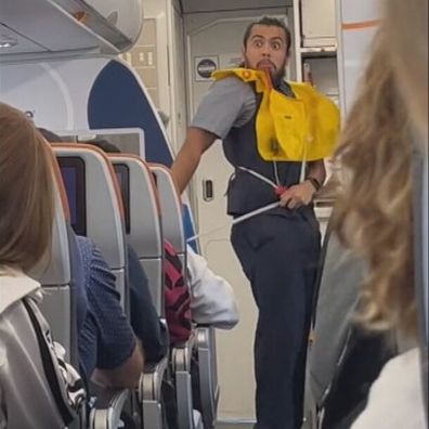 JetBlue flight attendant theatric mime routine