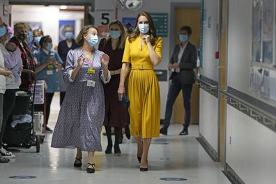 Kate, the Princess of Wales, centre right, visits the Royal Surrey County Hospital's maternity unit, in Guilford, England, Wednesday, Oct. 5, 2022