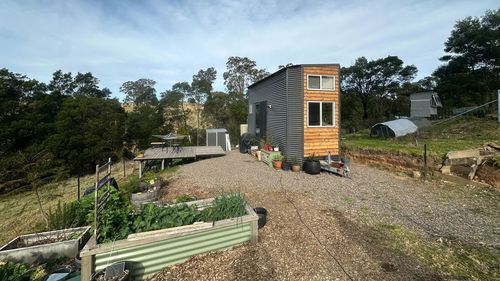 Josh Heins insists his home should fall under vehicle regulations, not building rules.