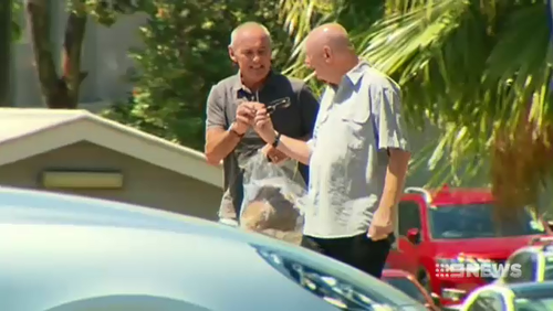 Chris Dawson was driven home to Queensland by his brother Peter, under strict bail conditions.