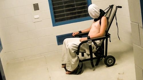 This image of Voller in a spit-hood and strapped to a restraint chair prompted the Prime Minister to order a Royal Commission into the Protection and Detention of Children in the Northern Territory. (60 Minutes)