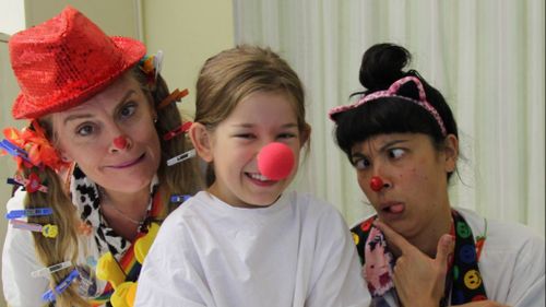 'Clown Doctors' celebrate 20 years of bringing smiles to sick Sydney children 