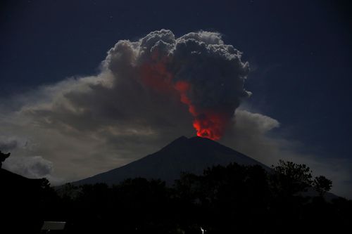 The eruption of Indonesia's Mount Agung volcano yesterday has affected thousands of travellers looking to fly into or out of the country. Picture: AAP.