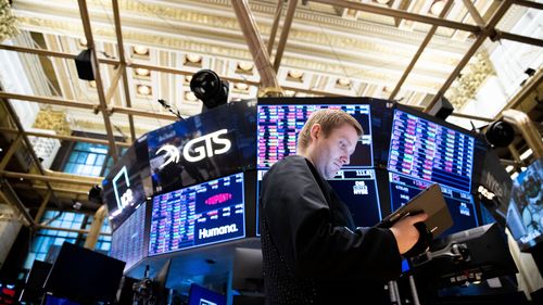 Traders work on the floor of the New York Stock Exchange 