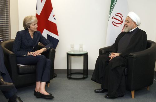 Ms May talks to Iranian president Hassan Rouhani in a side meeting at the UN.