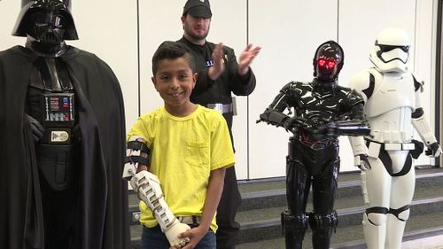 Darth Vader and Stormtroopers surprise young boy with new prosthetic arm