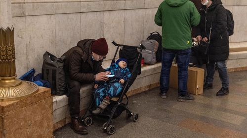 People shelter in a subway in Kyiv 