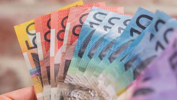 handful of australian money cash