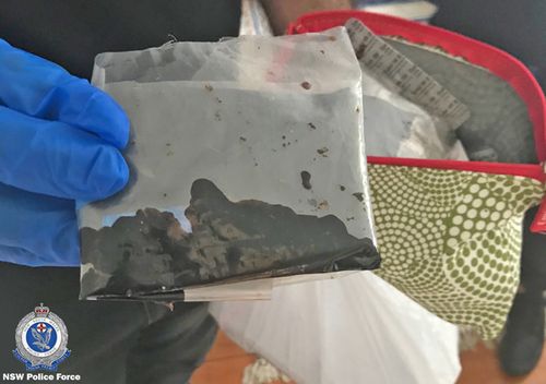 The opium allegedly found has an estimated potential street value of more than $3.4 million.