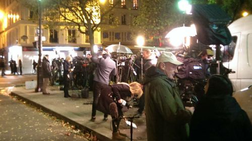 World's media line streets near Paris attack sites
