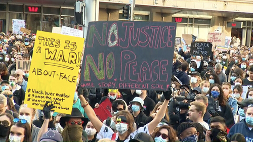 A Black Lives Matter protest outside Sydney Town Hall in June attracted a crowd of thousands.