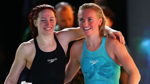 Mollie O'Callaghan (left) and Ariarne Titmus.