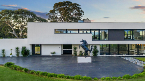 Melbourne mansion with a bespoke "Ferrari bar" expected to sell for around $9.5 million.