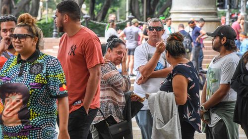 Bowraville community members react outside the Supreme Court in Sydney.