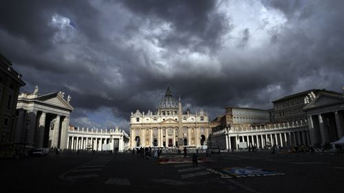 Clouds hang over St. Peter's Basilica, at the Vatican