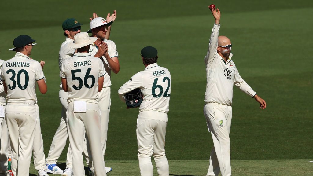 Nathan Lyon 'confirms place in cricket history' with 'outstanding' 500th Test wicket in Perth as Aussies rip through Pakistan