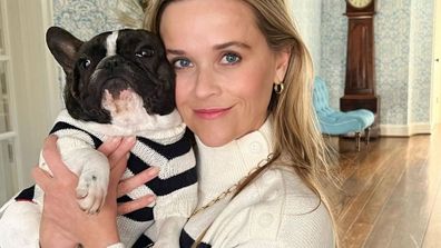 Reese Witherspoon wears matching outfit with her dog.