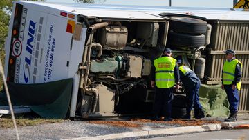 The bus carrying wedding guests rolled over on a foggy night, killing 10 and injuring 25 people.