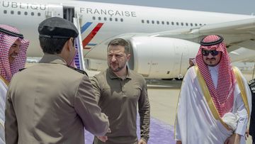 Ukraine&#x27;s President Volodymyr Zelenskyy is greeted by Prince Badr Bin Sultan, deputy governor of Mecca, right, upon his arrival at Jeddah airport, Saudi Arabia, Friday, May 19, 2023.