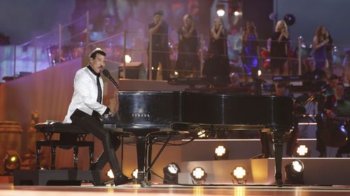 US singer Lionel Richie performs during a concert at Windsor Castle in Windsor, England, Sunday, May 7, 2023, celebrating the coronation of King Charles III. It's one of several events over a three-day weekend of celebrations. (Chris Jackson/Pool Photo via AP)