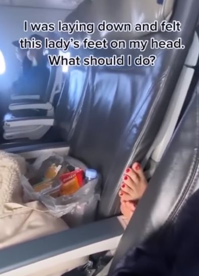 Feet on seat during flight