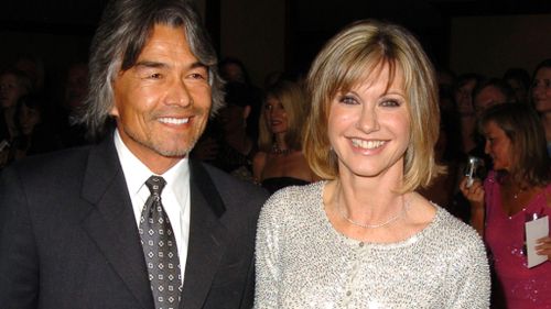 Patrick McDermott and Olivia Newton-John before his 2005 disappearance. (Getty)