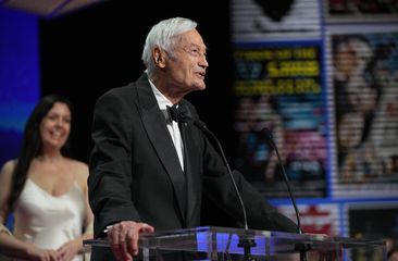 FILE - Roger Corman addresses the audience during the awards ceremony of the 76th international film festival, Cannes, southern France, Saturday, May 27, 2023. Corman, the Oscar-winning King of the Bs who helped turn out such low-budget classics as Little Shop of Horrors and Attack of the Crab Monsters and gave many of Hollywood&#x27;s most famous actors and directors an early break, died Thursday, May 9, 2024. He was 98. (AP Photo/Daniel Cole, File)