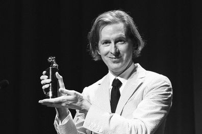 VENICE, ITALY - SEPTEMBER 01: (EDITORS NOTE: Image has been converted to black and white.) Wes Anderson with the Cartier Glory to the Filmmaker Award at the Cartier Glory To The Filmmaker Award Ceremony at the 80th Venice International Film Festival on September 01, 2023 in Venice, Italy. (Photo by Vittorio Zunino Celotto/Getty Images)