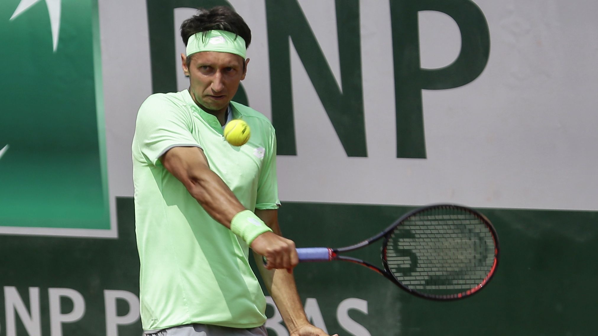Ukraine&#x27;s Sergiy Stakhovsky returns during his men&#x27;s singles match in the first round of Roland Garros qualifications.