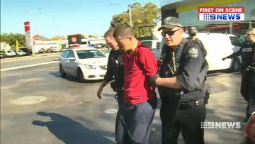 Home invasion suspect tackled by police at service station