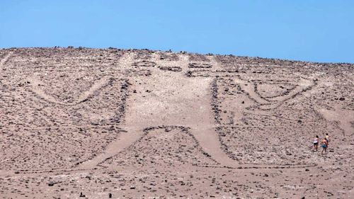 The Atacama Giant is a millennium-old, but was damaged by Belgian tourists.