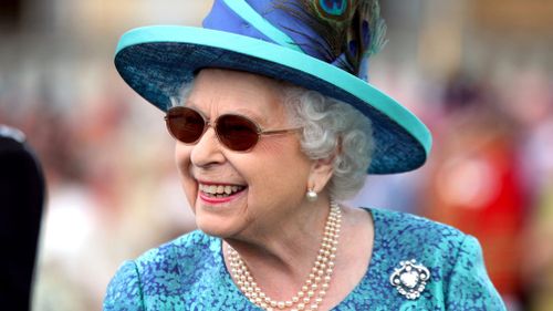 The palace made the announcement yesterday after the queen was seen wearing sunglasses at a number of recent public engagements. Picture: AP