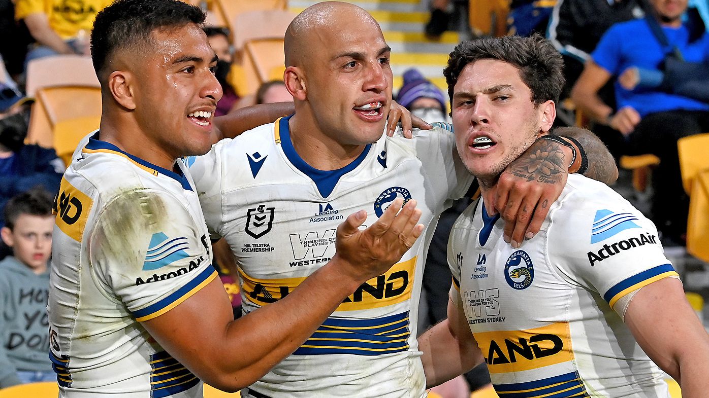 Blake Ferguson of the Eels is congratulated by team mates after scoring a try 