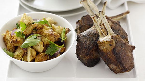 Baharat lamb with warm bread and herb salad