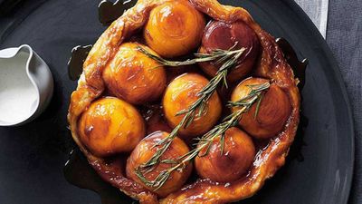 Recipe: <a href="http://kitchen.nine.com.au/2016/05/16/18/21/peach-and-rosemary-tarte-tatin-with-runny-cream" target="_top">Peach and rosemary tarte tatin with runny cream</a>